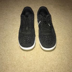 Nike black flu-knit shoes